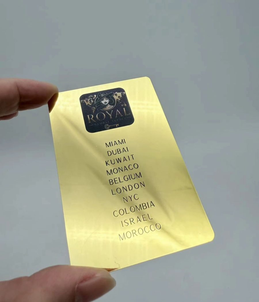 Mirror gold card with full-color Royal Global Agency logo and engraved list of cities