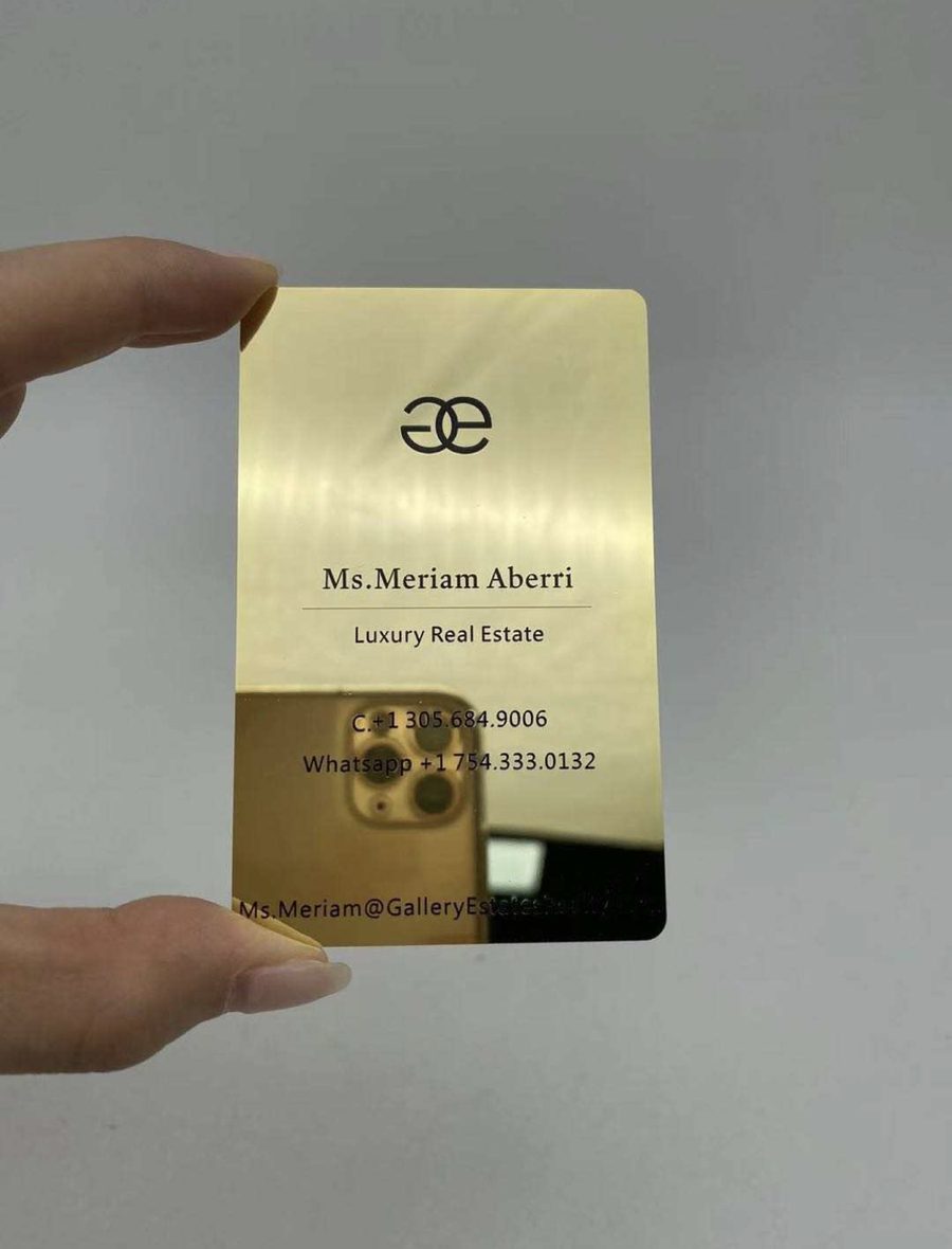 Brushed gold card with engraved monogram